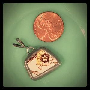 Broken china pendant charm.